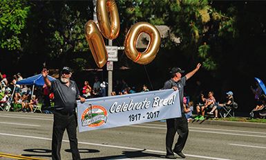 Photo of the lead Centennial Banner in the Centennial Parade